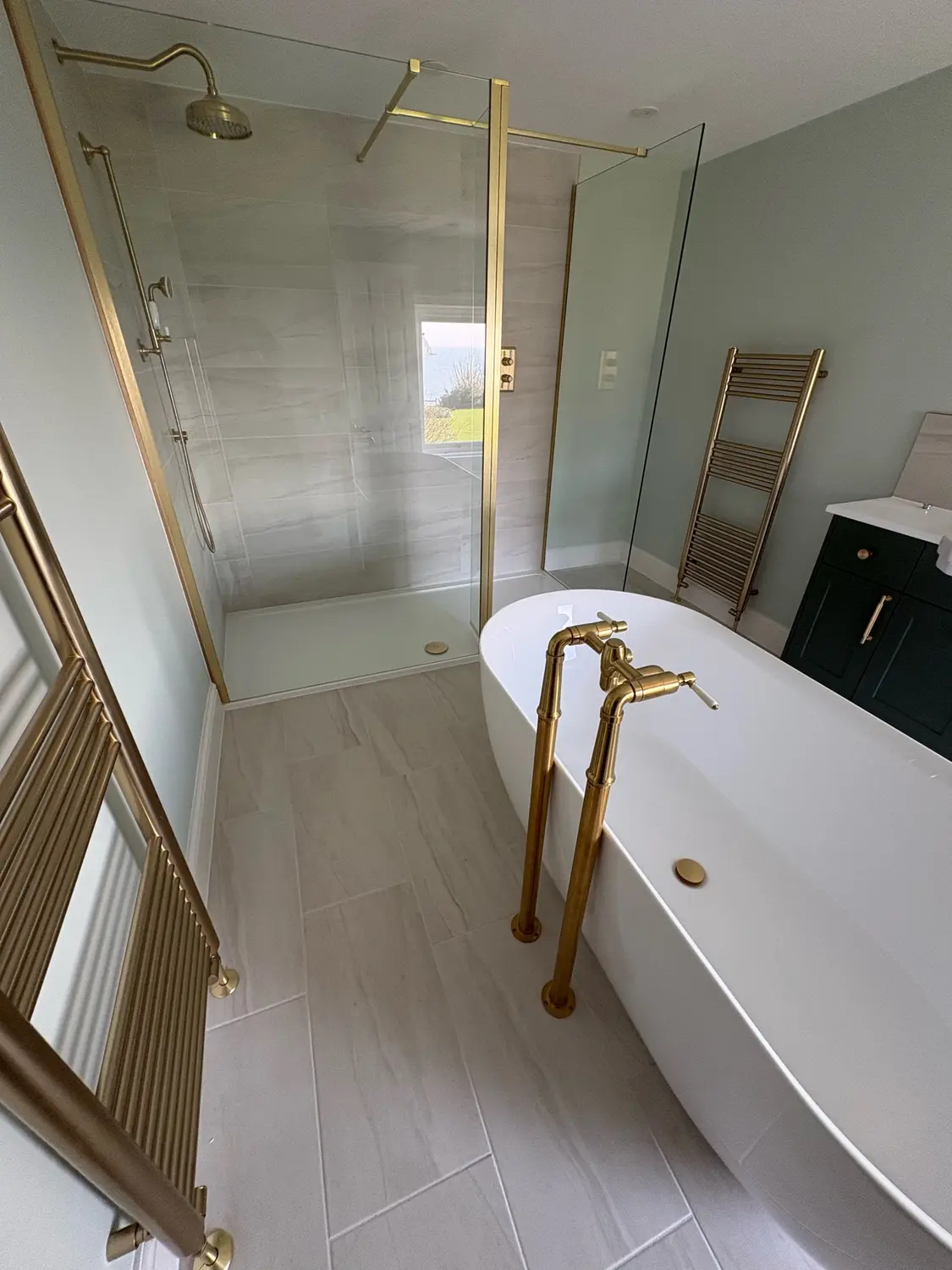 Freestanding Bath and Brass Bathroom